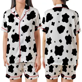 Modern Trendsetters' Bold High-Contrast Jet Black Organic Cowhide Spot Pattern Satin Short-Sleeve Pajamas Set