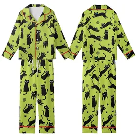 Cat Lovers' Vibrant Lime Green Playful Black Cat Silhouettes Flat Cartoon Pattern with Blue Eye Accent Kid Satin Pajamas Set
