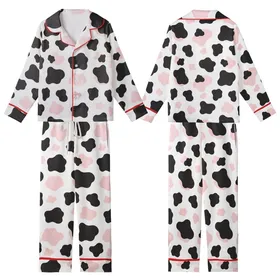 Modern Fashion Enthusiasts' Playful White Black Pastel Pink Organic Cow Blotches Kid Satin Pajamas Set
