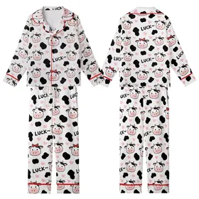 Cow Lovers' Seamless Cute Cartoon Cow Heads & Spots Pattern with Pink Muzzles, Tan Horns, Red Bows, 'LUCK~' Text, Pink Hearts Kid Satin Pajamas Set