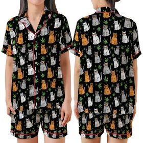Playful Cat & Cannabis Enthusiasts' Flat Art Cats Orange Sunglasses Green Cannabis Leaves Seamless Black Pattern Satin Short-Sleeve Pajamas Set