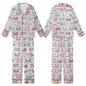 Kawaii Cat Lovers' Seamless Pastel Pink Teal Blue White Cartoon Cat Faces Pattern with Bows, Hearts, & Sunglasses Kid Satin Pajamas Set