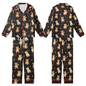 Sweet Style Enthusiasts' Charcoal Black Plush Caramel Bear Hearts Orange Flowers Seamless Pattern Kid Satin Pajamas Set