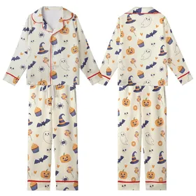 Whimsical Halloween Enthusiasts' Cream Orange Indigo Jack-o'-Lantern Ghost Bat Sweet Treats Pattern Kid Satin Pajamas Set