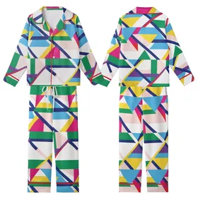Vibrant Style Enthusiast: Dynamic Geometric Stripe - Multi-Color Patterned Print Kid Satin Pajamas Set