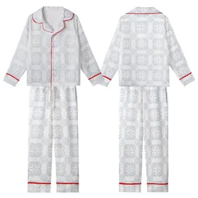 Elegant Geometric Pattern: Interlocking Quatrefoil Muted Blue Swirl Line Art Design Kid Satin Pajamas Set