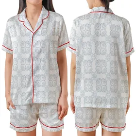 Elegant Geometric Pattern: Interlocking Quatrefoil Muted Blue Swirl Line Art Design Satin Short-Sleeve Pajamas Set