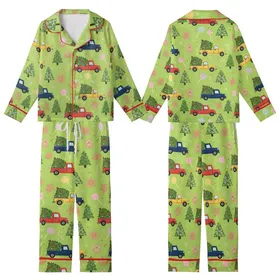 Christmas Enthusiasts' Whimsical Lime Green Pattern with Red Trucks, Forest Trees, Gingerbread Men, Pastel Pink & Purple Candy Kid Satin Pajamas Set