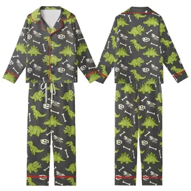 Dinosaur Lovers' Whimsical Lime Green Cartoon Dinosaur & Off-White Fossil Repeat Pattern on Dark Charcoal Grey Kid Satin Pajamas Set