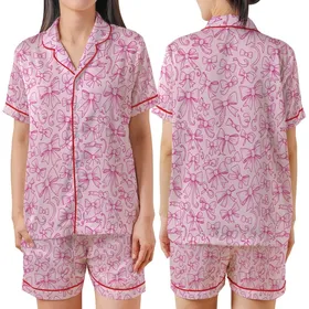 Charming Fashion: Hand-Drawn Fuchsia Bow & Ribbon Pattern - Pastel Pink Wearable Print Satin Short-Sleeve Pajamas Set