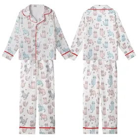 Feline Fan's Whimsical Pastel Cartoon Cats: Curious, Stretching, Sitting Figures All-Over Print Kid Satin Pajamas Set