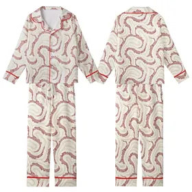 Feminine Style: Soft Plush Undulating Ribbed Texture with Fluid Ruffle Accents - Cream, Rose, Mauve Hues Satin Short-Sleeve Pajamas Set