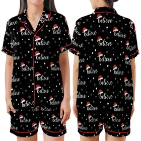 Festive Believer's Repeating White 'Believe' Script, Red Santa Hat, White Stars & Snowflakes Pattern Design Satin Short-Sleeve Pajamas Set