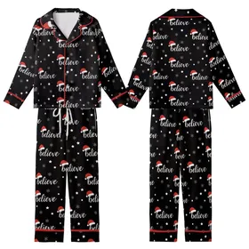 Festive Believer's Repeating White 'Believe' Script, Red Santa Hat, White Stars & Snowflakes Pattern Design Kid Satin Pajamas Set