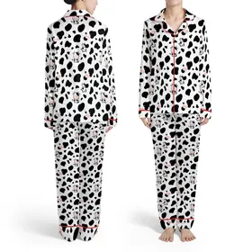 White Design with Black Cow Spots, Cow Heads, Pink Noses, & White Spotted Figures Satin Pajamas Set