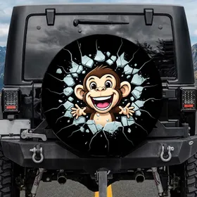 Mischievous Grinning Monkey Tearing Cracked Surface from Dark Void Car Decor Gift Spare Tire Cover