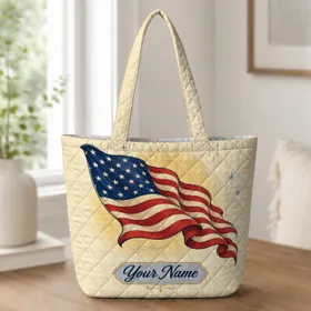 Flowing American Flag Travel Essential For Patriotic Getaways And Everyday Carry Quilted Tote Bag