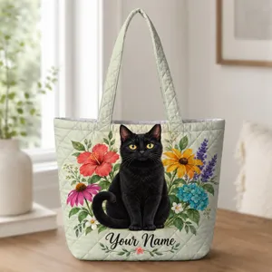 Black Cat Among Colorful Garden Blooms for Whimsical Everyday Adventures and Gifting Quilted Tote Bag