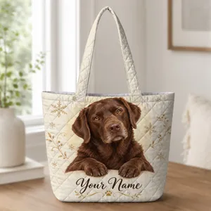 Chocolate Labrador and Snowflakes for Cozy Winter Holiday Gifts for Dog Lovers Quilted Tote Bag