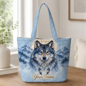 Blue Wolf Beneath Moonlit Peaks for Nature Lovers and Winter Birthday Gifting for Women Quilted Tote Bag