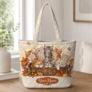 Autumn Kittens Nestled in a Leaf Basket for Cozy Fall Days and Thoughtful Cat Lovers Quilted Tote Bag