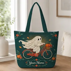 Ghost Riding Bicycle With Pumpkin for Whimsical Halloween Cottagecore Gifts Quilted Tote Bag