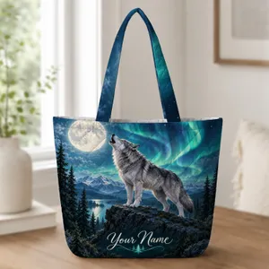 Howling Wolf Beneath Northern Lights for Wilderness Adventures and Nature Lovers Gift Quilted Tote Bag