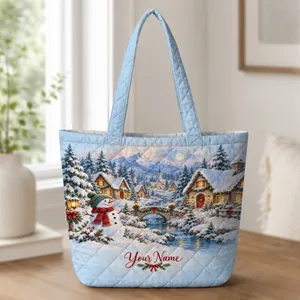 Snowy Christmas Village and Snowman for Cozy Winter Holiday Cheer and Seasonal Gifting Quilted Tote Bag