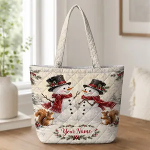 Snowpeople and Squirrels in a Winter Holiday Scene for Cozy Seasonal Outings Quilted Tote Bag