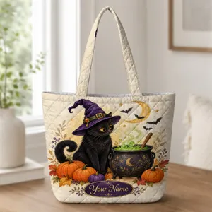Witch Hat Black Cat and Bubbling Cauldron for Cozy Halloween Nights and Cat Lovers Quilted Tote Bag