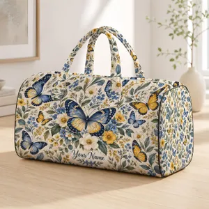 Blue and Golden Butterflies with Wildflowers for Weekend Travel and Garden Getaways Quilted Weekend Bag