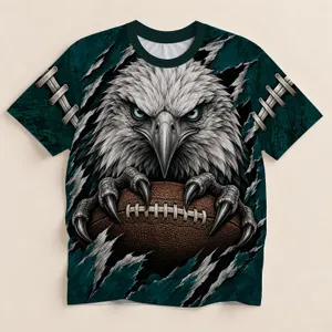 Fierce Eagle Gripping Football for Game Day Tailgates and Weekend Fan Style Lovers All-over Print Unisex T-shirt