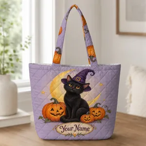 Black Cat Witch Hat and Pumpkin Halloween Travel Companion for Cozy Autumn Getaways Quilted Tote Bag
