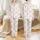 Women's Whimsical Hand-Drawn Muted Dusty Pink Bow & Ribbon All-Over Pattern on Off-White Satin Pajamas Set - 1