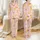 Golden Retriever Lovers' Pastel Pink Playful Retriever Dog Pattern with Joyful Poses, Paw Prints & Wildflowers Satin Pajamas Set - 1