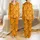 Women's Vibrant Orange Yellow Stylized Graphic Flames Abstract Black Swirling Shapes Seamless Pattern Satin Pajamas Set - 1