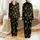 Women's Whimsical Golden Yellow Crescent Moons & Starbursts on Deep Black Graphic Satin Pajamas Set - 1