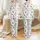 Women's Whimsical Hand-Drawn Nutcracker Ballet Pattern with Ballerinas, Soldiers, Trees, and Lollipops in Pastel Blue, Pink, Red, Gold Satin Pajamas Set - 1