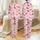 Women's Whimsical Fuchsia Hot Pink Magenta Bows with Crisp Black Outlines on Soft Blush Pink Satin Pajamas Set - 1