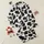 Women's Whimsical Black & White Organic Cow Spot Interlocking Pattern Satin Pajamas Set - 1