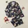 Cow Lovers' Festive Highland Cow Winter Scene Seamless Pattern with Red Santa Hats, Plaid Scarves, and Holly on Navy Satin Pajamas Set - 1