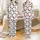 Festive Celebration: Black Reindeer Antlers, Multicolored Lights, Red Santa Hats, Green Plaid Snowflakes Satin Pajamas Set - 1