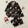 Festive Families' Whimsical Black Christmas Lights, Playful Santa, & Elf All-Over Pattern with Multi-Color Bulbs Satin Pajamas Set - 1