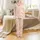 Kids' Groovy Pastel Daisy Magnetic Footed Pajamas: Pink Yellow Checkerboard Print Satin Pajamas Set - 2