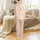 Kids' Groovy Pastel Daisy Magnetic Footed Pajamas: Pink Yellow Checkerboard Print Satin Pajamas Set - 3