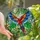 Nature Lovers' Tiffany Stained Glass Vibrant Red Orange Parrot Teal Blue Wings Lush Tropical Foliage Mosaic Stained Glass Suncatcher - 1