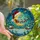 Holiday Art Enthusiasts' Tiffany Stained Glass Santa Moon Sleigh Snowy Village Jewel Tone Indigo Teal Crimson Gold Mosaic Stained Glass Suncatcher - 1