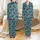 Christmas Monster Truck Pattern: Playful Teal Design with Red Trucks, Trees, & Sleighs Satin Pajamas Set - 1