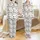 Whimsical Holiday Pattern: Joy Peace Merry Believe Text & Pinecone Holly Art - Seamless Vector Print Satin Pajamas Set - 1