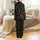 Family Group "Most Likely To" Christmas Pajamas: Festive Activity Pattern & Holiday Illustrations on Black Satin Pajamas Set - 3